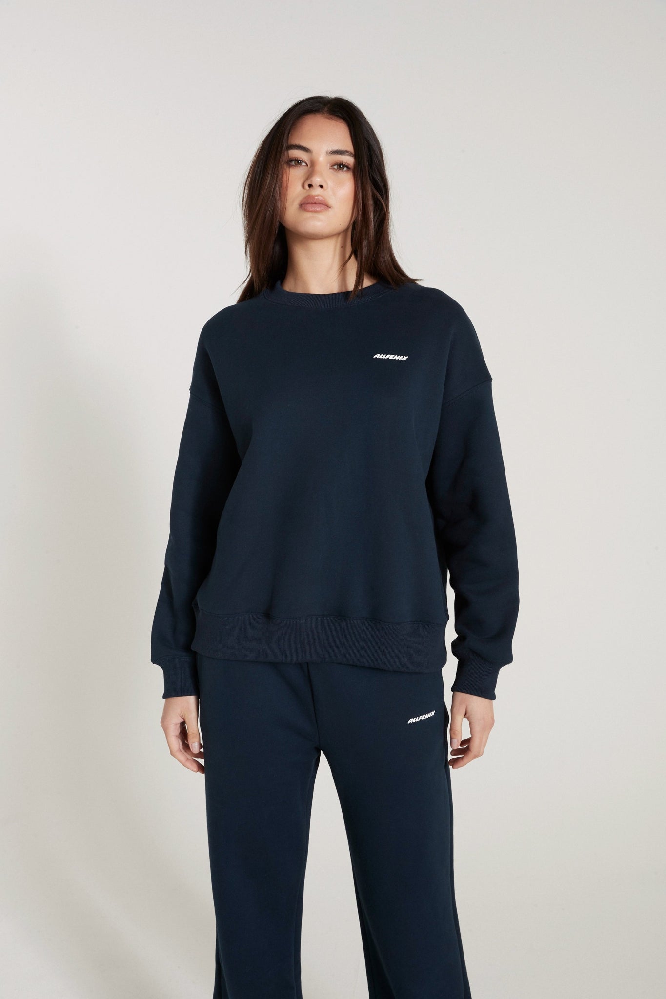 All Fenix Signature Crew Sweater Zippered Front Buttoned Front Snap Front